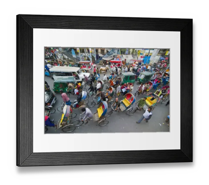 Framed Print : Very busy Rickshaw traffic on a street crossing in Dhaka, Bangladesh, Asia Framed Print : Very busy Rickshaw traffic on a street crossing in Dhaka, Bangladesh, Asia