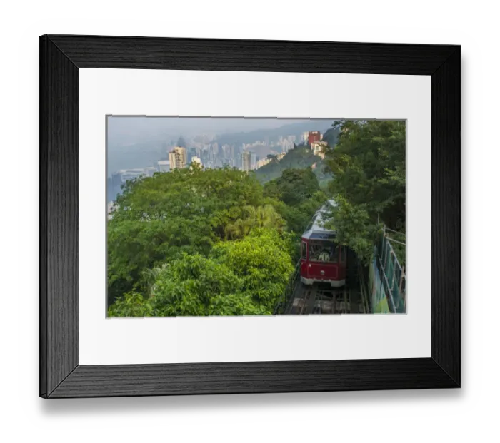 Framed Print : Hong Kong China Victoria Peak Tram going down mountain on smoggy hazy foggy day with