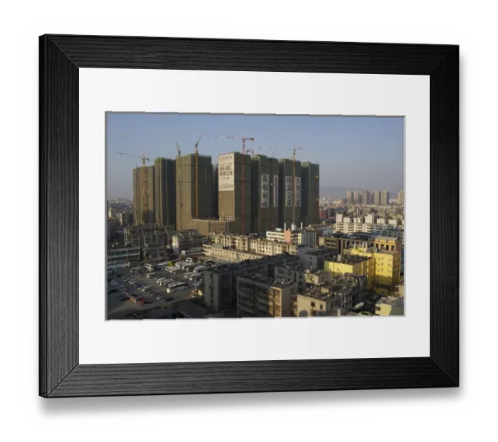 Framed Print : China, Yunnan Province, Mile. Building under construction in city Framed Print : China, Yunnan Province, Mile. Building under construction in city