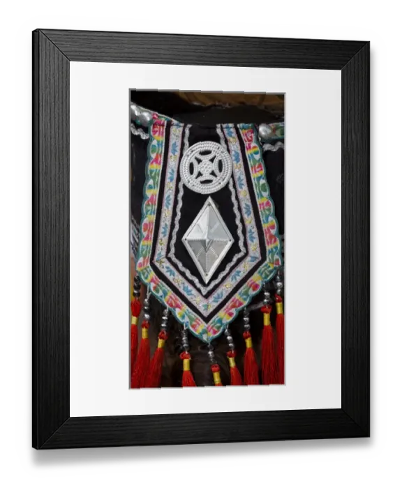 Framed Print : Kunming Ethnic Minorities Village Park, China head dress of a young native lady Framed Print : Kunming Ethnic Minorities Village Park, China head dress of a young native lady