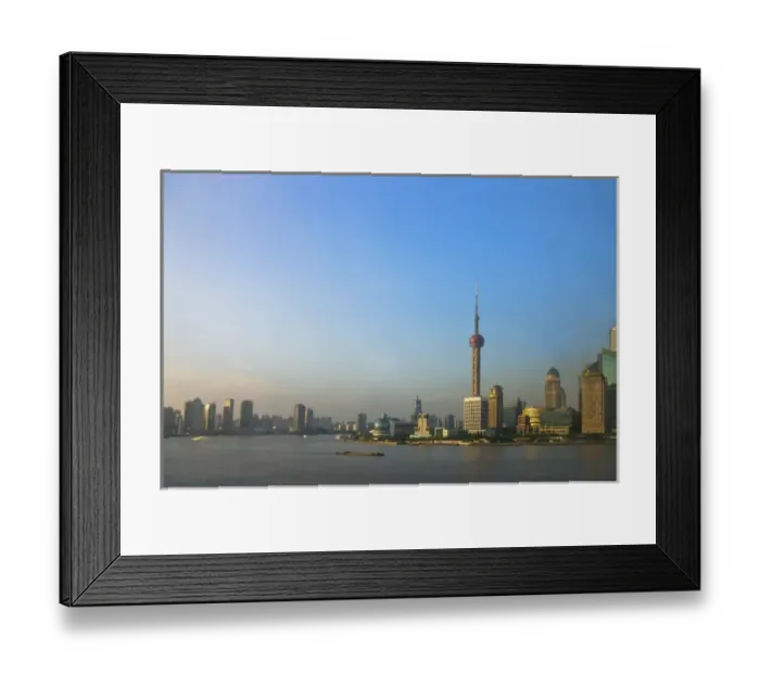 Framed Print : View of Pudong skyline dominated by Oriental Pearl TV Tower by Huangpu River, Shanghai