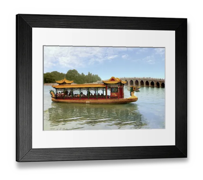 Framed Print : The Summer Palace, Beijing, China, a traditional Dragon Boat passes the Seventeen Framed Print : The Summer Palace, Beijing, China, a traditional Dragon Boat passes the Seventeen