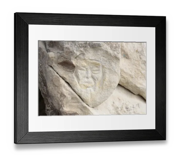 Framed Print : Georgia, Uplistsikhe. A face carved into a stone wall