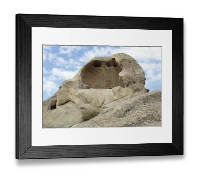 Framed Print : Georgia, Uplistsikhe. A section of carved stone holes