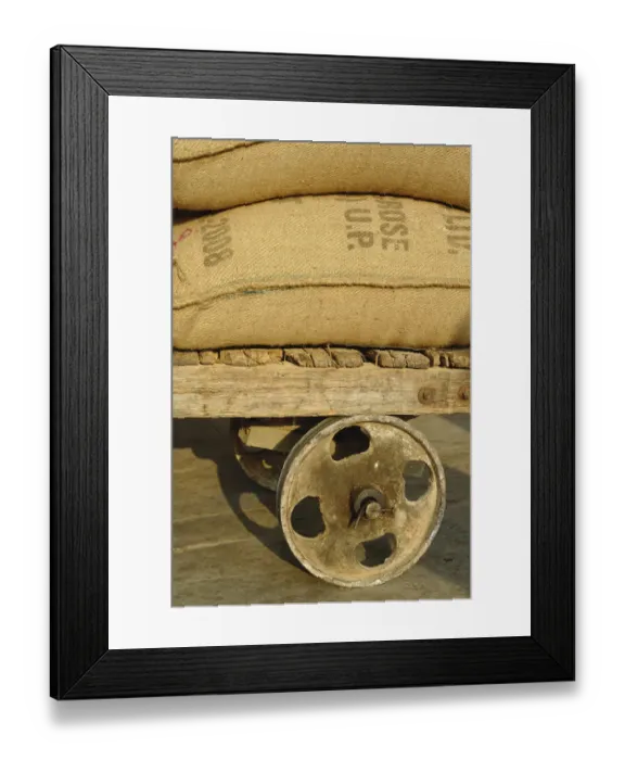 Framed Print : Grains in burlap sacks on primitive cart, train station, Udaipur, India Framed Print : Grains in burlap sacks on primitive cart, train station, Udaipur, India