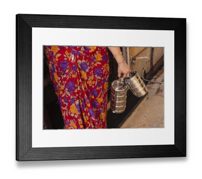 Framed Print : India, Rajasthan, Jaisalmer. Woman in traditional dress holding lunch boxes Framed Print : India, Rajasthan, Jaisalmer. Woman in traditional dress holding lunch boxes