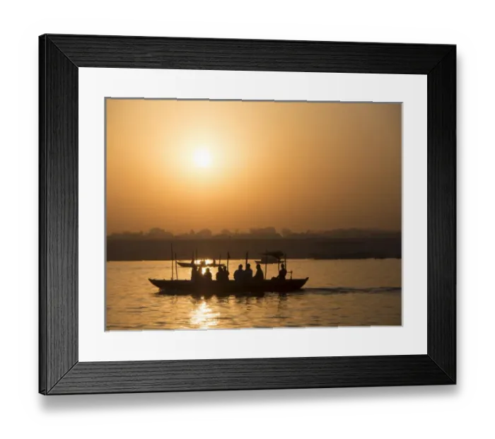 Framed Print : Silhouette of passengers on boat over river during sunrise in Varanasi, Uttar Pradesh