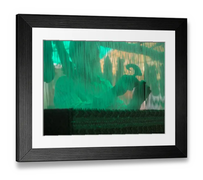 Framed Print : Silhouette of man operating handloom machine in Jaipur, Rajasthan, India