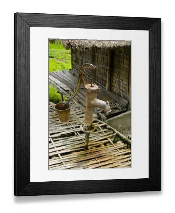 Framed Print : Sumoimari Ghat, Majuli Island, Assam State, India water pump at the Village of Mising Framed Print : Sumoimari Ghat, Majuli Island, Assam State, India water pump at the Village of Mising