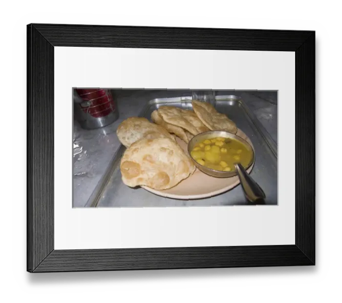 Framed Print : Plate of Indian fried bread (nan) and dal in northeastern India