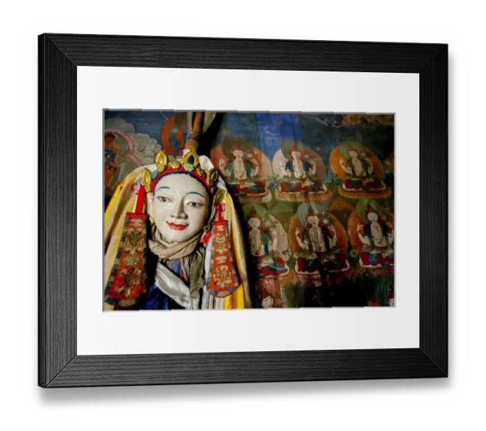 Framed Print : India, Jammu & Kashmir, Ladakh, a religious statue in front of a mural of repetitive