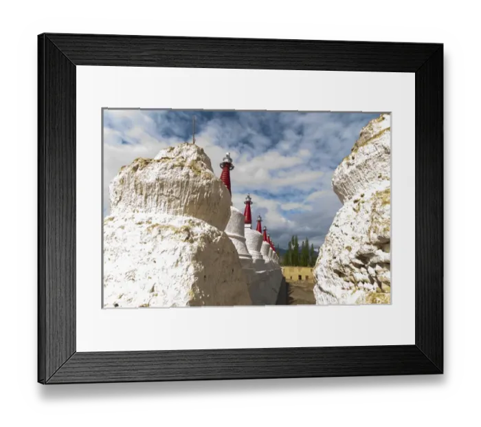 Framed Print : India, Jammu & Kashmir, Ladakh, Leh, chortons against a blue sky with puffy white