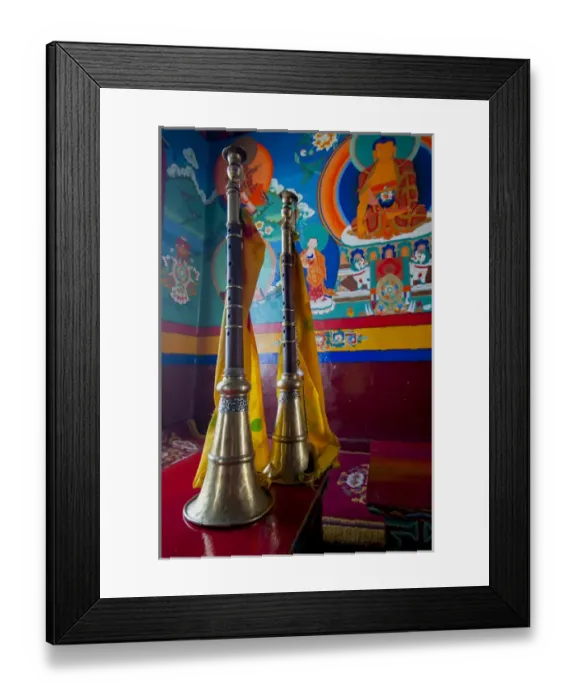 Framed Print : India, Jammu & Kashmir, Ladakh, two ceremonial horns in front of a painted wall with Framed Print : India, Jammu & Kashmir, Ladakh, two ceremonial horns in front of a painted wall with