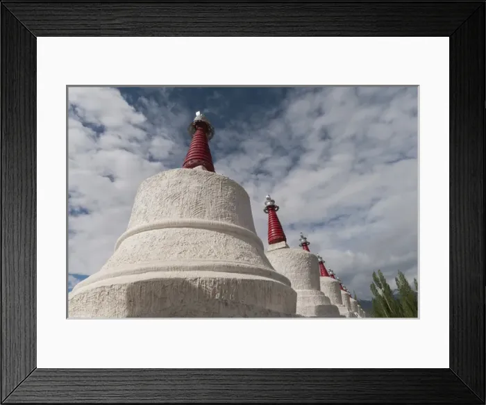 Framed Print : India, Jammu & Kashmir, Ladakh, Leh, chortons against a blue sky with puffy white