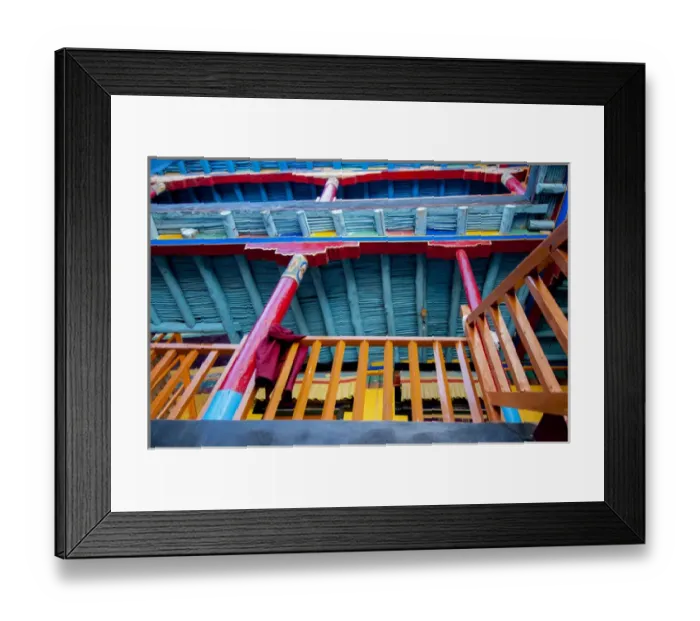 Framed Print : India, Jammu & Kashmir, Ladakh, brightly painted building detail with a monk s