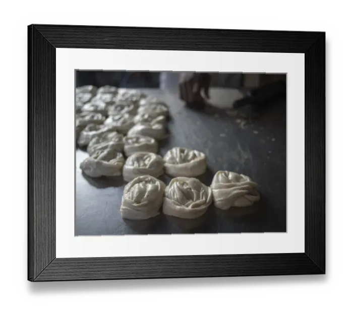 Framed Print : Bits of dougH are rolled into mounds Tto be cooked in Bangalore, Karnataka, India