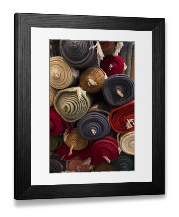 Framed Print : Asia, India, Rajasthan, the making of carpets. Rolled carpets for sale Framed Print : Asia, India, Rajasthan, the making of carpets. Rolled carpets for sale