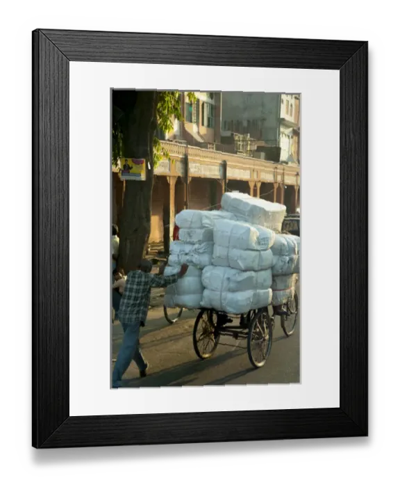 Framed Print : Man pushing an overloaded cart, Jaipur, Rajasthan, India