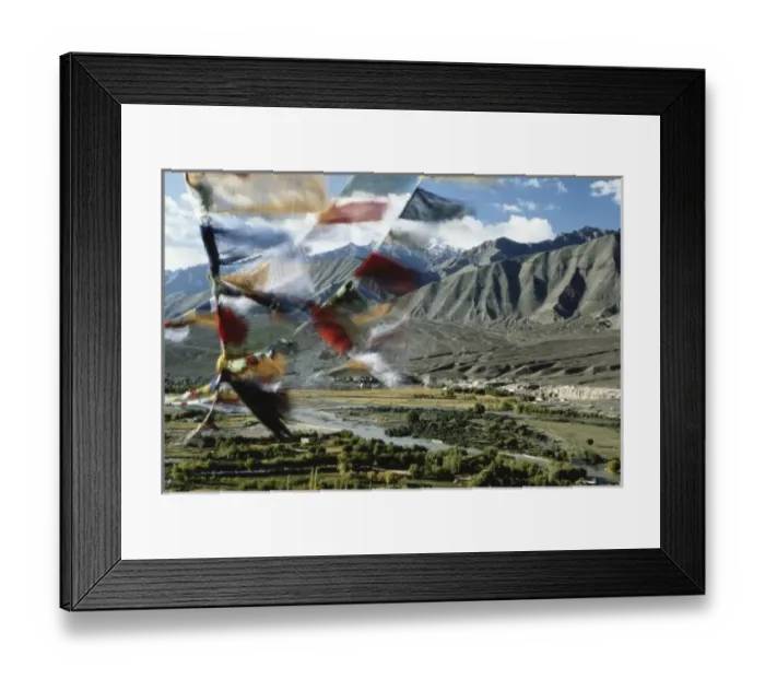 Framed Print : Bunting flying in sky with mountain in background Framed Print : Bunting flying in sky with mountain in background