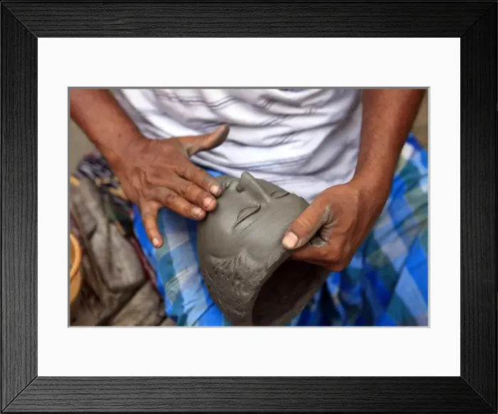 Framed Print : Asia, India, Calcutta. Sculptor hands work on face the potters village of Kumartuli Framed Print : Asia, India, Calcutta. Sculptor hands work on face the potters village of Kumartuli