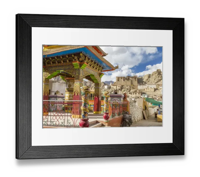 Framed Print : Prayer wheel & Leh Palace in background, Leh, Ladakh, India Framed Print : Prayer wheel & Leh Palace in background, Leh, Ladakh, India