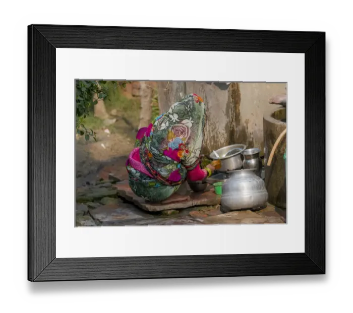 Framed Print : Woman washing dishes. Fatehpur Sikri village. Bharatpur. Rajasthan. India Framed Print : Woman washing dishes. Fatehpur Sikri village. Bharatpur. Rajasthan. India