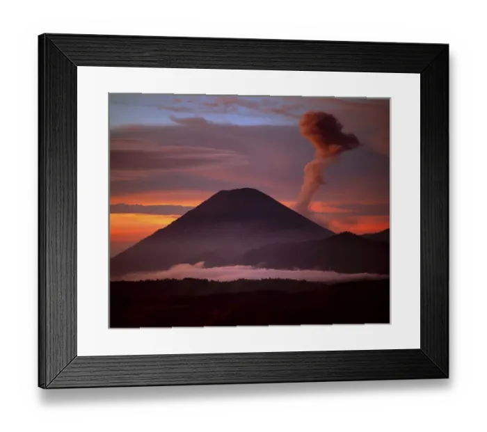 Framed Print : Indonesia. Mt. Semeru emits a plume of smoke moved by strong winds at sunrise. Credit as Framed Print : Indonesia. Mt. Semeru emits a plume of smoke moved by strong winds at sunrise. Credit as