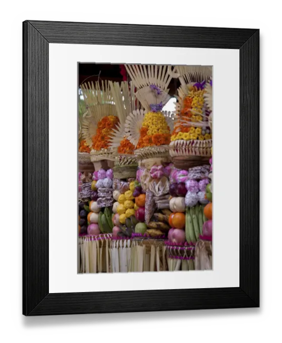 Framed Print : Indonesia, Bali, Bedulu. Row of colorful offerings at Pura Samuan Tiga temple. Credit as