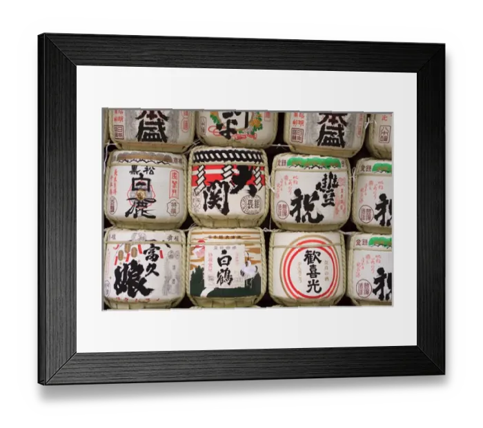 Framed Print : Decoration barrels of sake are often found on display at Japanese shrines to represent