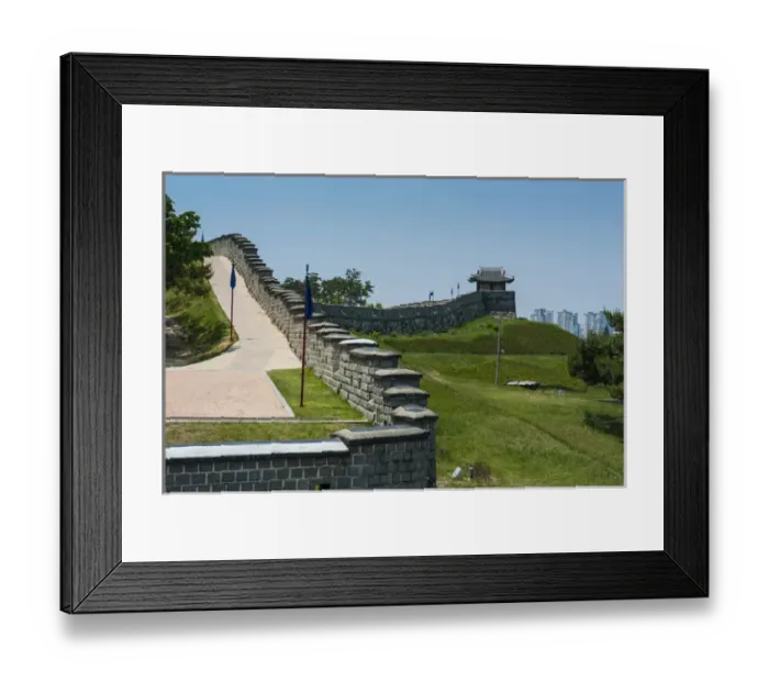 Framed Print : Huge stone walls around the Unesco world heritage sight the fortress of Suwon, South Framed Print : Huge stone walls around the Unesco world heritage sight the fortress of Suwon, South