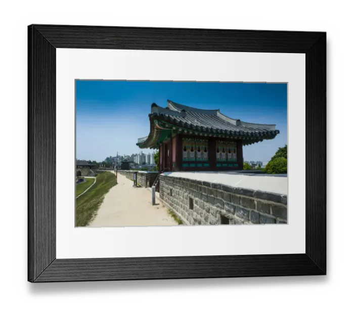 Framed Print : Huge stone walls around the Unesco world heritage sight the fortress of Suwon, South Framed Print : Huge stone walls around the Unesco world heritage sight the fortress of Suwon, South