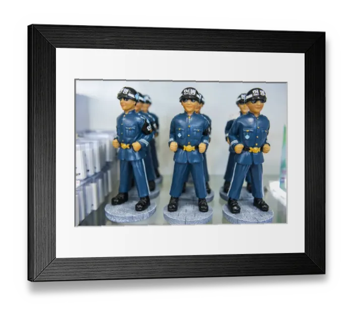 Framed Print : Model soldiers as a souvenir at the high security border between South and North Korea Framed Print : Model soldiers as a souvenir at the high security border between South and North Korea