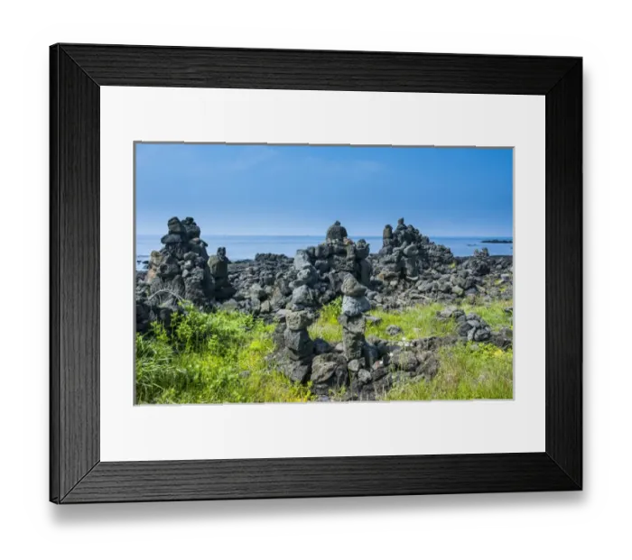 Framed Print : Stone walls made by tourists on the Unesco world heritage sight the island of Jejudo Framed Print : Stone walls made by tourists on the Unesco world heritage sight the island of Jejudo