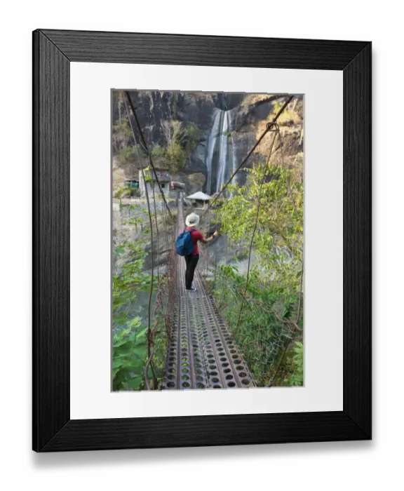 Framed Print : Tourist walking on suspending bridge with waterfall, Baguio, Benguet Province, Philippines Framed Print : Tourist walking on suspending bridge with waterfall, Baguio, Benguet Province, Philippines