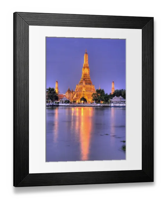 Framed Print : Thailand, Bangkok, Wat Arun. Ornate Buddhist temple reflects in river at dusk. Credit as