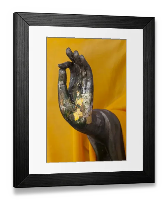 Framed Print : Thailand. Buddha Statue hand with gold leaf tokens
