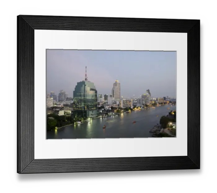 Framed Print : Thailand, Bangkok. Downtown Bangkok, evening skyline view of the Chao Phraya river Framed Print : Thailand, Bangkok. Downtown Bangkok, evening skyline view of the Chao Phraya river