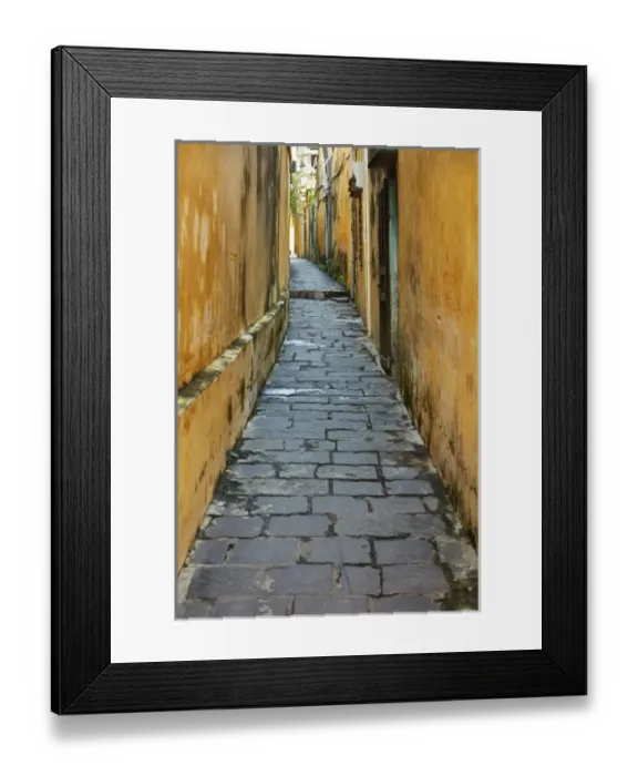 Framed Print : Cobblestones and yellow walls in alleyway, Hoi An (UNESCO World Heritage Site), Vietnam Framed Print : Cobblestones and yellow walls in alleyway, Hoi An (UNESCO World Heritage Site), Vietnam