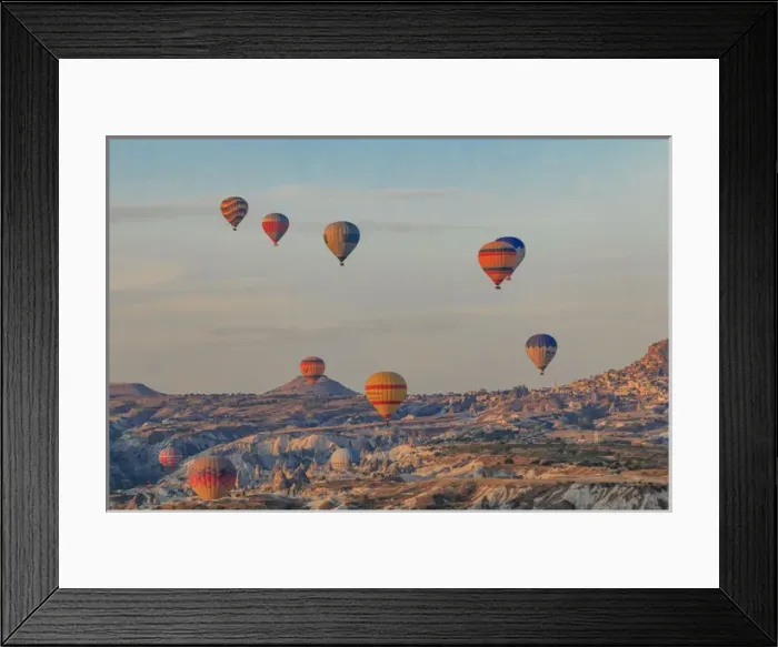 Framed Print : Turkey, Anatolia, Cappadocia, Goreme. Hot air balloons flying above / among rock formations Framed Print : Turkey, Anatolia, Cappadocia, Goreme. Hot air balloons flying above / among rock formations