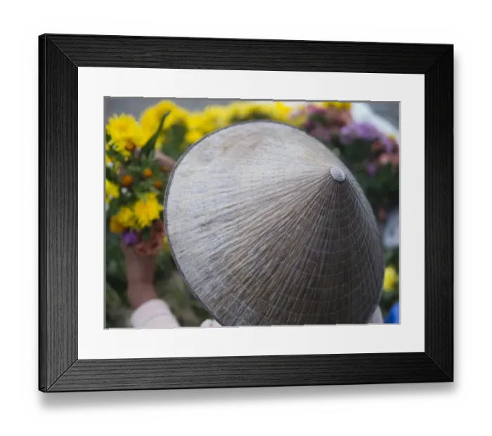 Framed Print : A woman sell flowers in Hoi An, Vietnam