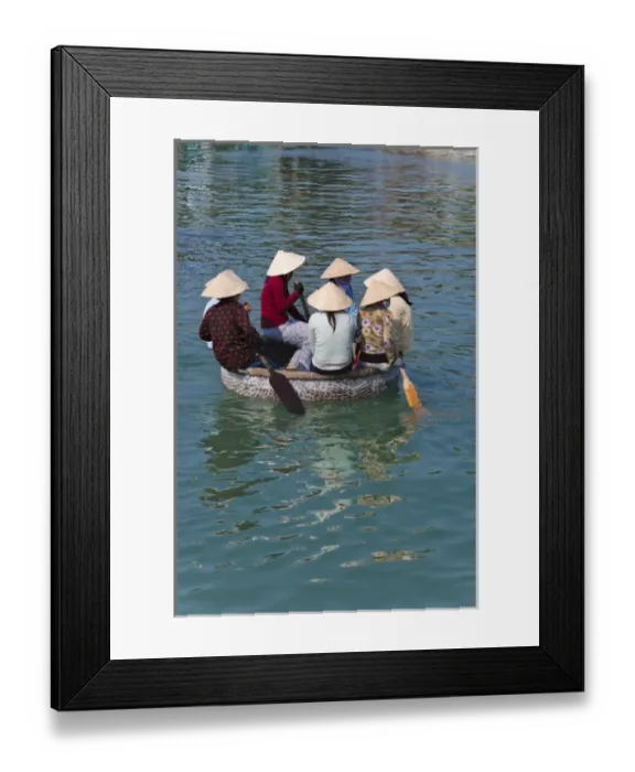 Framed Print : Girl with conical hat in bamboo made basket boat Framed Print : Girl with conical hat in bamboo made basket boat