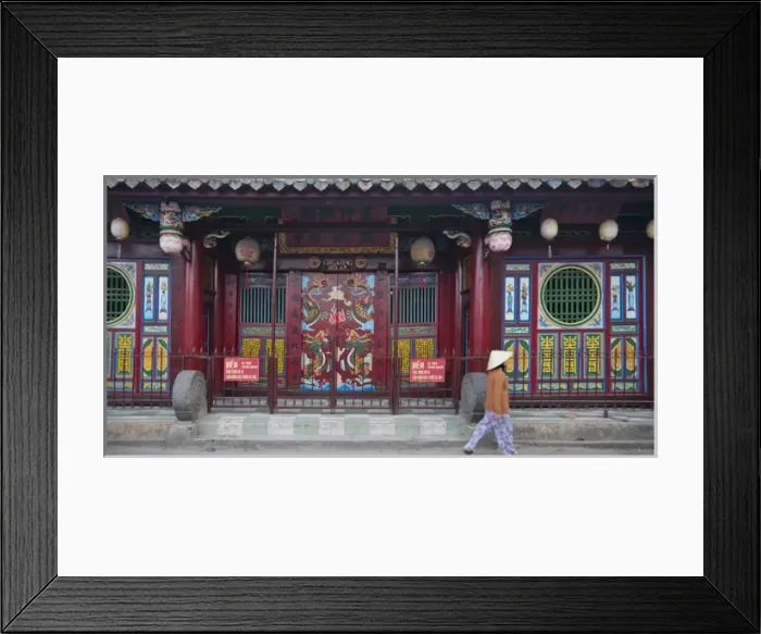 Framed Print : Woman with conical hat outside Chinese temple in Hoi An Ancient Town, UNESCO World Framed Print : Woman with conical hat outside Chinese temple in Hoi An Ancient Town, UNESCO World