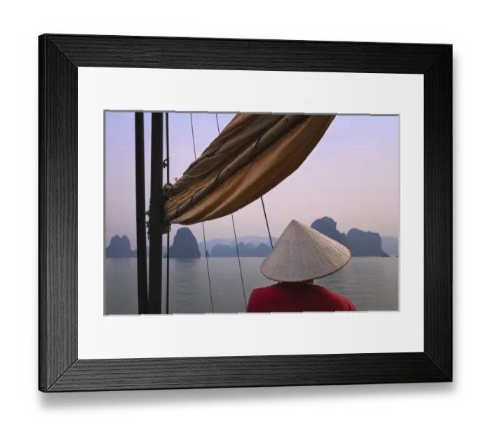 Framed Print : Girl with conical hat on a junk boat and karst islands in Halong Bay, UNESCO World