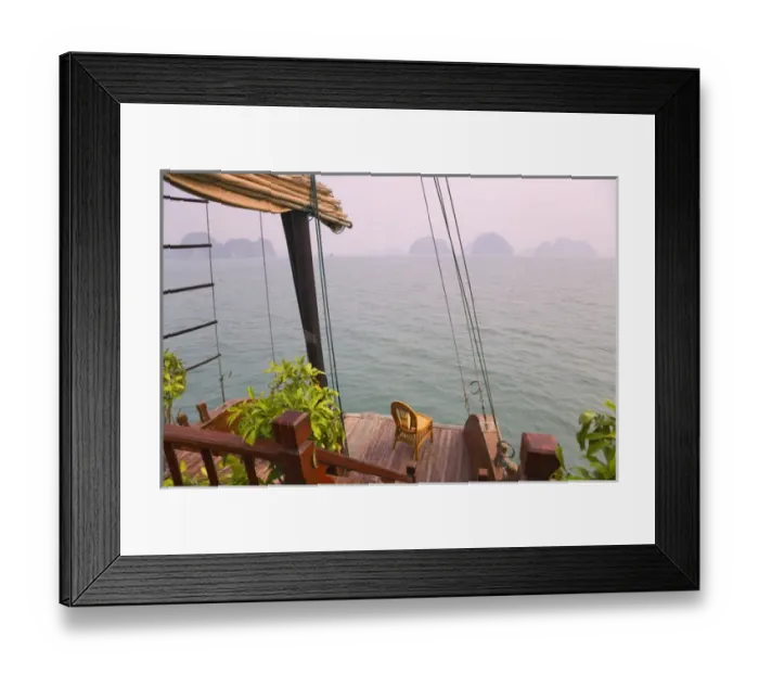 Framed Print : Junk boat and karst islands in Halong Bay, UNESCO World Heritage site Framed Print : Junk boat and karst islands in Halong Bay, UNESCO World Heritage site