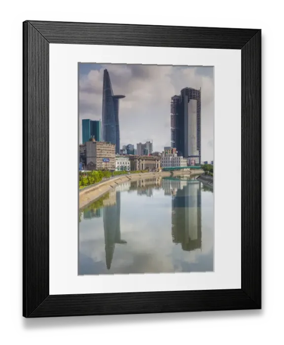 Framed Print : Vietnam, Ho Chi Minh City, city view with Bitexco Tower along the Ben Nghe Canal Framed Print : Vietnam, Ho Chi Minh City, city view with Bitexco Tower along the Ben Nghe Canal