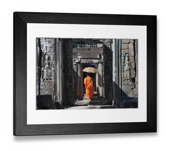Framed Print : Monk with Buddhist statues in Banteay Kdei, UNESCO World Heritage site Framed Print : Monk with Buddhist statues in Banteay Kdei, UNESCO World Heritage site