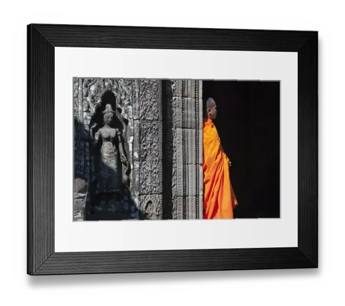 Framed Print : Monk with Buddhist statues in Banteay Kdei, UNESCO World Heritage site Framed Print : Monk with Buddhist statues in Banteay Kdei, UNESCO World Heritage site