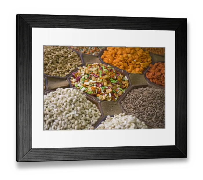 Framed Print : Selling nuts and dried fruit at the market, Dubai, UAE Framed Print : Selling nuts and dried fruit at the market, Dubai, UAE