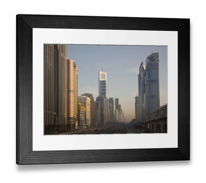 Framed Print : United Arab Emirates, Dubai. Towers along Sheik Zayed Road looking north. Credit as Framed Print : United Arab Emirates, Dubai. Towers along Sheik Zayed Road looking north. Credit as