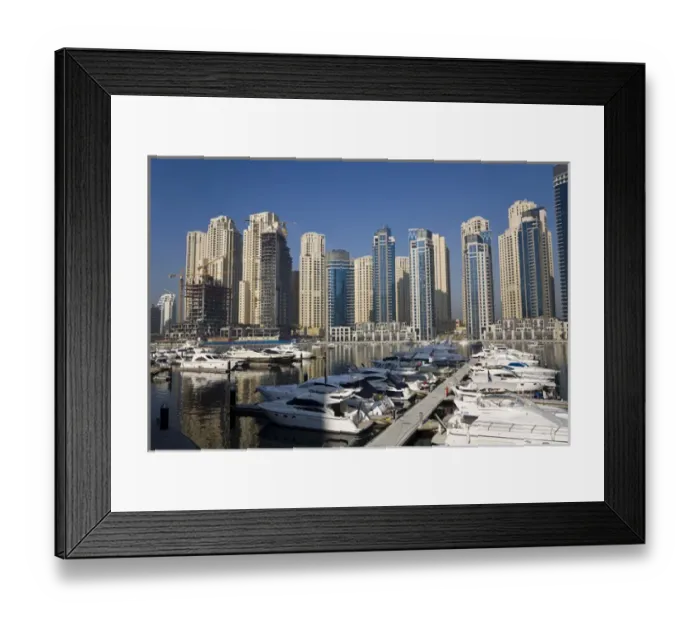 Framed Print : United Arab Emirates, Dubai. Marina towers with boats at anchor Framed Print : United Arab Emirates, Dubai. Marina towers with boats at anchor